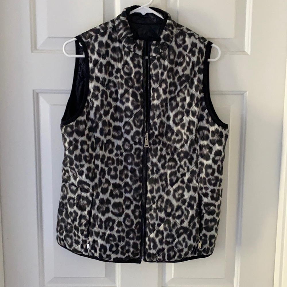 Reversible puffy vest black/animal print